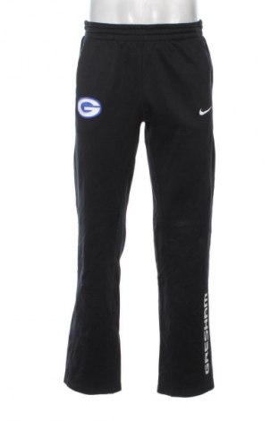 Męskie spodnie sportowe Nike, Rozmiar M, Kolor Czarny, Cena 82,99 zł