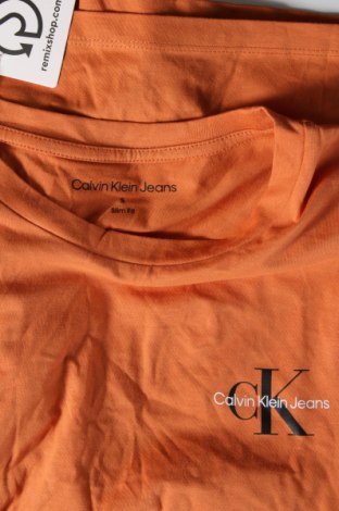 Dámske tričko Calvin Klein Jeans, Veľkosť S, Farba Oranžová, Cena  16,25 €