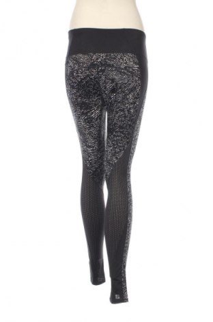 Damskie legginsy Domyos, Rozmiar M, Kolor Kolorowy, Cena 36,99 zł