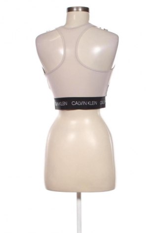 Top sport de damă. Calvin Klein, Mărime L, Culoare Bej, Preț 65,99 Lei