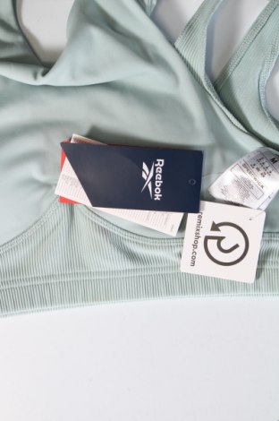 Top sport de damă. Reebok, Mărime M, Culoare Albastru, Preț 253,49 Lei