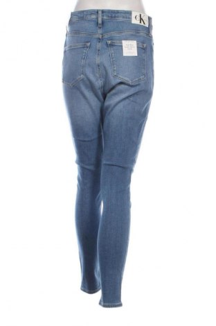 Γυναικείο Τζίν Calvin Klein Jeans, Μέγεθος L, Χρώμα Μπλέ, Τιμή 86,99 €