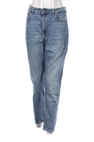 Damskie jeansy H&M, Rozmiar L, Kolor Niebieski, Cena 95,99 zł