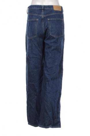 Damskie jeansy H&M, Rozmiar M, Kolor Niebieski, Cena 95,99 zł