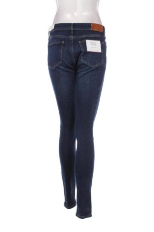 Damskie jeansy Tommy Hilfiger, Rozmiar L, Kolor Niebieski, Cena 431,45 zł