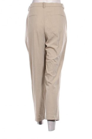Pantaloni de femei Uniqlo, Mărime L, Culoare Bej, Preț 141,99 Lei