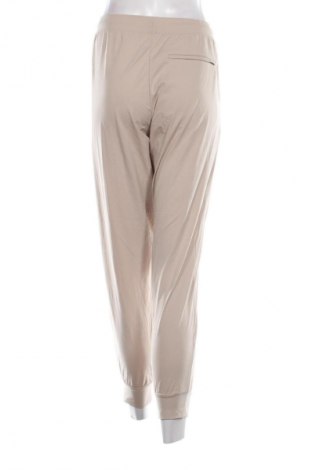 Pantaloni de femei Uniqlo, Mărime L, Culoare Bej, Preț 141,99 Lei