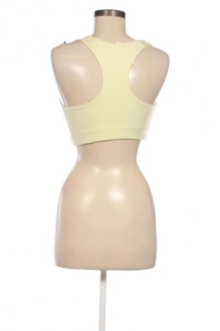 Top sport de damă. H&M, Mărime M, Culoare Galben, Preț 38,92 Lei