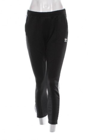 Damskie spodnie sportowe Adidas Originals, Rozmiar M, Kolor Czarny, Cena 134,99 zł