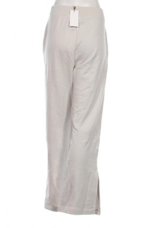 Női sport nadrág Calvin Klein Jeans, Méret L, Szín Bézs, Ár 42 249 Ft