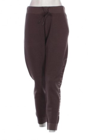Damen Sporthose Calvin Klein Jeans, Größe M, Farbe Lila, Preis 139,99 €