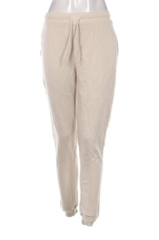 Damskie spodnie sportowe Infinity Woman, Rozmiar M, Kolor Beżowy, Cena 95,99 zł