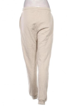 Damskie spodnie sportowe Infinity Woman, Rozmiar M, Kolor Beżowy, Cena 95,99 zł