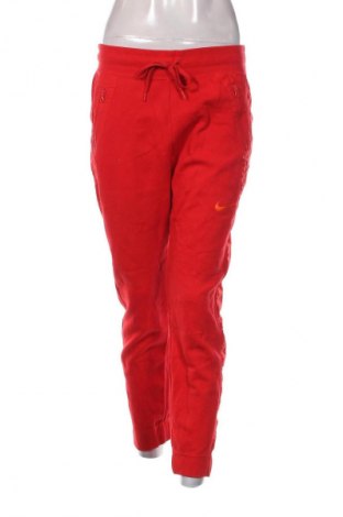 Damskie spodnie sportowe Nike, Rozmiar M, Kolor Czerwony, Cena 134,99 zł