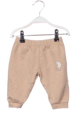 Детско спортно долнище U.S. Polo Assn., Размер 9-12m/ 74-80 см, Цвят Бежов, Цена 34,00 лв.