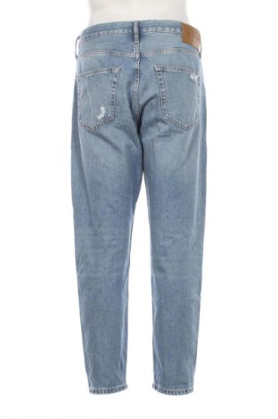 Męskie jeansy Calvin Klein, Rozmiar L, Kolor Niebieski, Cena 504,99 zł
