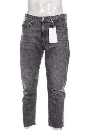 Pánske džínsy  Calvin Klein Jeans, Veľkosť L, Farba Sivá, Cena  89,95 €