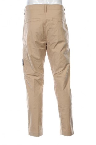 Pantaloni de bărbați Calvin Klein Jeans, Mărime M, Culoare Bej, Preț 579,99 Lei