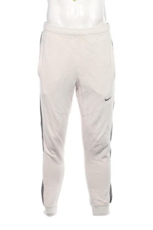 Męskie spodnie sportowe Nike, Rozmiar M, Kolor Kolorowy, Cena 157,99 zł