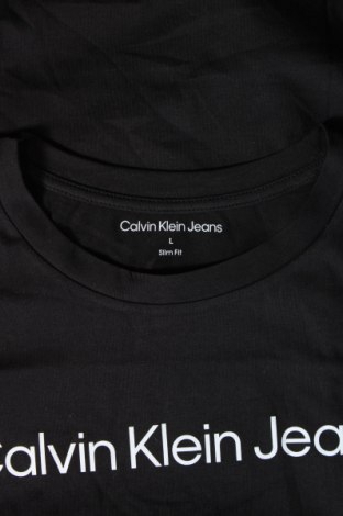 Γυναικείο t-shirt Calvin Klein, Μέγεθος L, Χρώμα Μαύρο, Τιμή 25,99 €