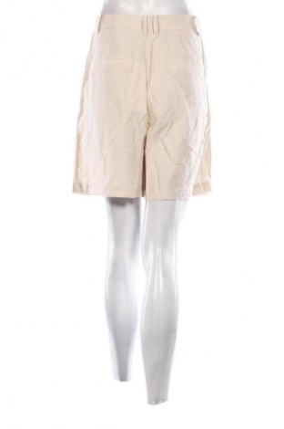 Damen Shorts Guido Maria Kretschmer for About You, Größe S, Farbe Beige, Preis € 7,49