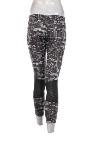 Damskie legginsy Domyos, Rozmiar L, Kolor Kolorowy, Cena 24,99 zł