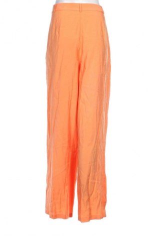 Pantaloni de femei Guido Maria Kretschmer for About You, Mărime XL, Culoare Portocaliu, Preț 58,99 Lei