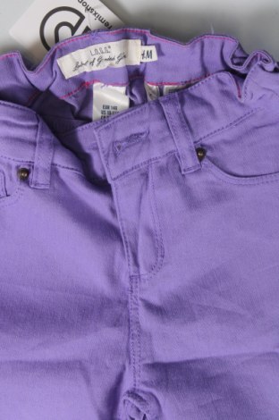 Dziecięce jeansy H&M L.O.G.G., Rozmiar 10-11y/ 146-152 cm, Kolor Fioletowy, Cena 20,99 zł