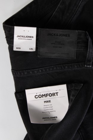 Herren Jeans Jack & Jones, Größe M, Farbe Grau, Preis 13,99 €