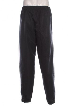 Pantaloni trening de bărbați Sergio Tacchini, Mărime L, Culoare Albastru, Preț 219,99 Lei