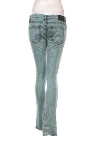 Damskie jeansy H&M Divided, Rozmiar L, Kolor Zielony, Cena 66,99 zł