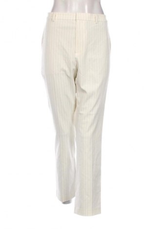 Damskie spodnie Uniqlo, Rozmiar L, Kolor Kolorowy, Cena 61,99 zł