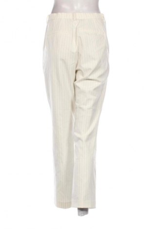 Damskie spodnie Uniqlo, Rozmiar L, Kolor Kolorowy, Cena 61,99 zł