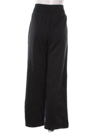 Pantaloni trening de femei Nike, Mărime M, Culoare Negru, Preț 322,99 Lei