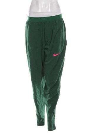 Damen Sporthose Nike, Größe L, Farbe Grün, Preis 28,99 €