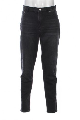 Męskie jeansy Calvin Klein Jeans, Rozmiar M, Kolor Czarny, Cena 322,99 zł