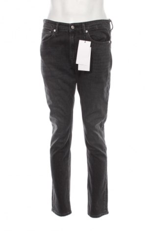 Pánske džínsy  Calvin Klein Jeans, Veľkosť L, Farba Čierna, Cena  61,95 €