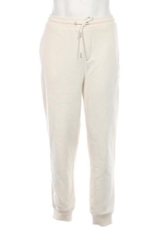 Pantaloni trening de bărbați Calvin Klein Jeans, Mărime XL, Culoare Ecru, Preț 519,99 Lei
