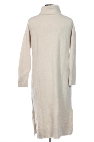 Рокля Uniqlo, Размер XS, Цвят Бежов, Цена 48,00 лв.