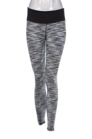 Damskie legginsy H&M Sport, Rozmiar M, Kolor Kolorowy, Cena 26,99 zł