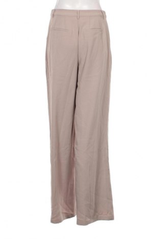 Damenhose ABOUT YOU x Iconic by Tatiana Kucharova, Größe M, Farbe Beige, Preis 14,99 €