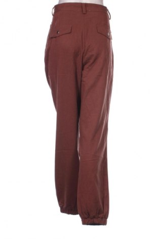 Damenhose Guido Maria Kretschmer for About You, Größe L, Farbe Braun, Preis € 11,29