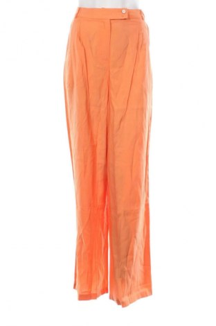 Damenhose Guido Maria Kretschmer for About You, Größe M, Farbe Orange, Preis 11,99 €