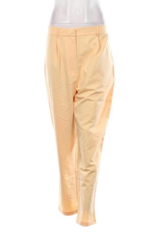 Damenhose Guido Maria Kretschmer for About You, Größe M, Farbe Orange, Preis 11,49 €