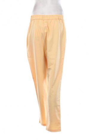 Damenhose Guido Maria Kretschmer for About You, Größe M, Farbe Orange, Preis 11,49 €