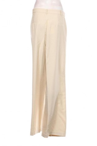 Pantaloni de femei Guido Maria Kretschmer for About You, Mărime M, Culoare Bej, Preț 91,99 Lei