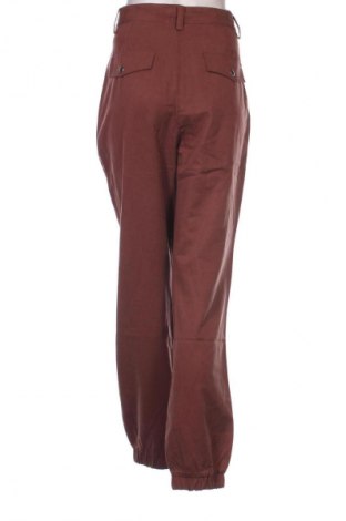 Damenhose Guido Maria Kretschmer for About You, Größe M, Farbe Braun, Preis 10,99 €