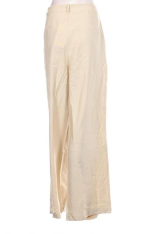 Pantaloni de femei Guido Maria Kretschmer for About You, Mărime L, Culoare Bej, Preț 91,99 Lei