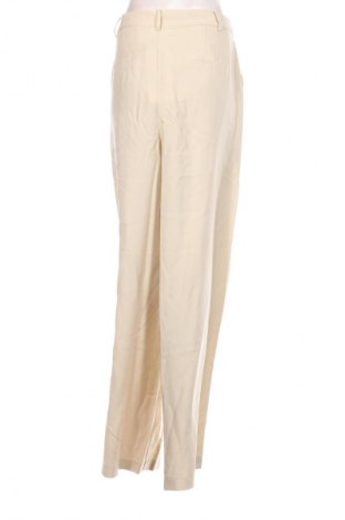 Pantaloni de femei Guido Maria Kretschmer for About You, Mărime L, Culoare Bej, Preț 73,99 Lei