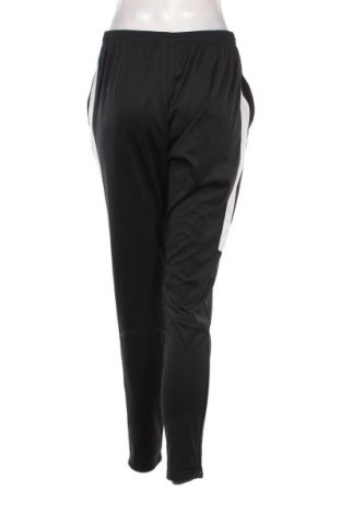 Pantaloni trening de femei Nike, Mărime M, Culoare Negru, Preț 134,99 Lei